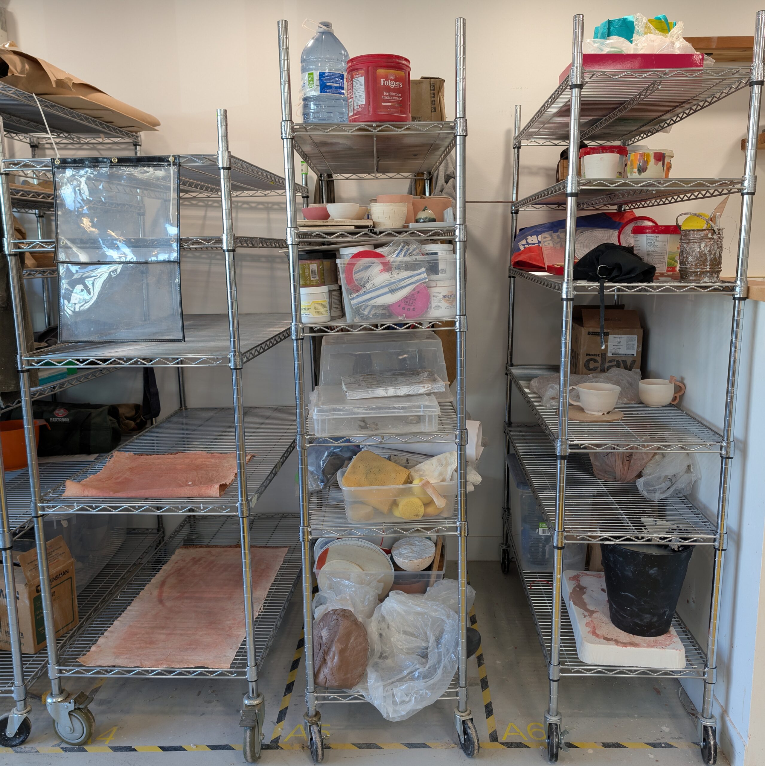 Rolling shelf storage at Maker Cube in Langley, BC, cart parking bay two feet by four feet that fits an 18 by 48 by 72 inch rolling shelf, $85/month